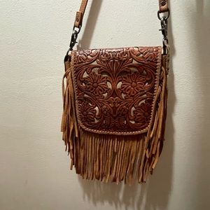 Leather tooled purse with fringe
